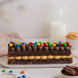 Barra de brownie, chocolate y manjar